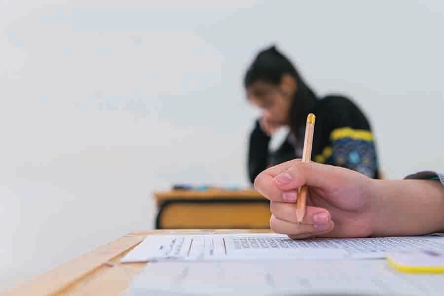 asian child concentrating during examination